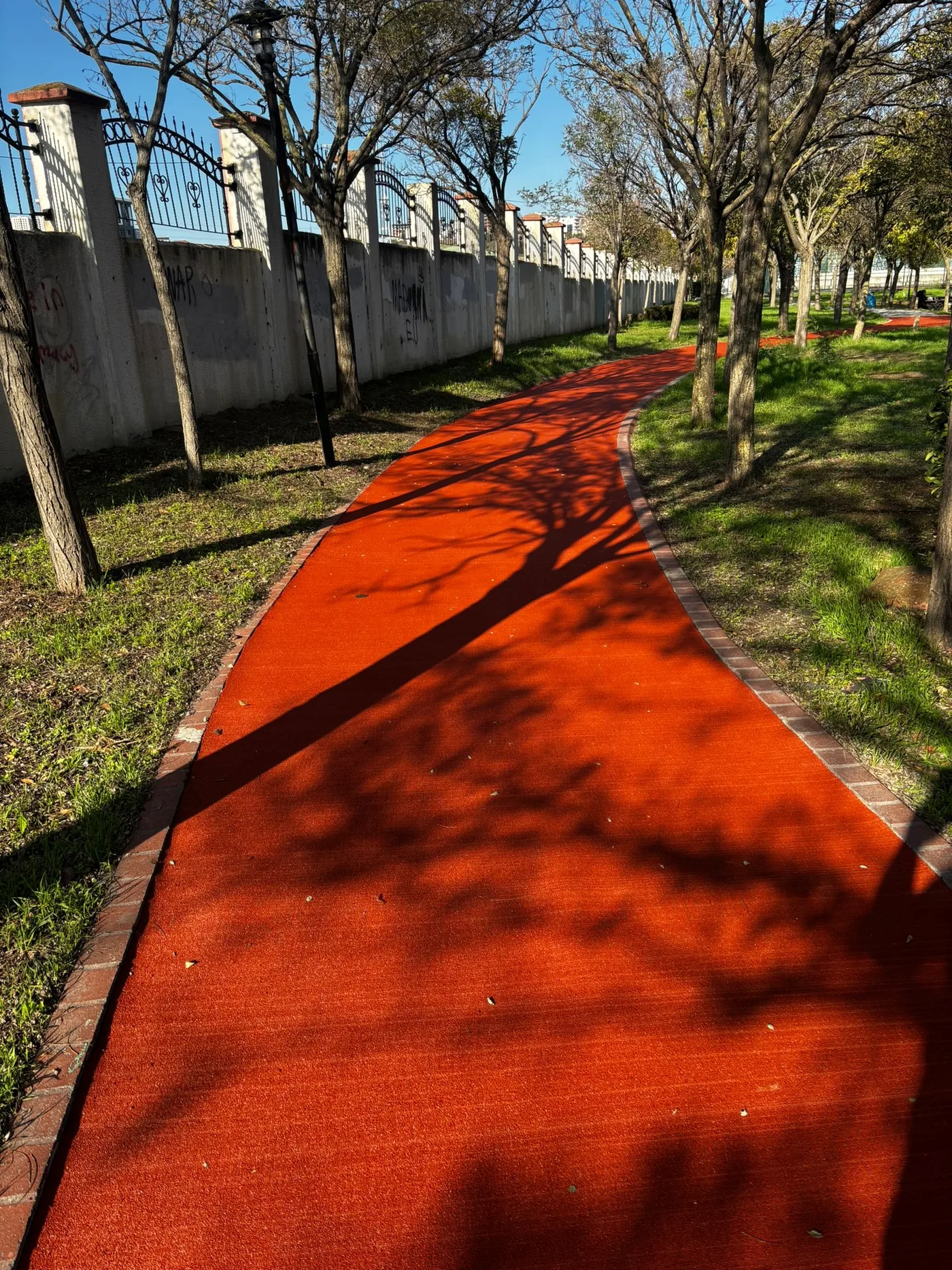 Rubber-surfaced track